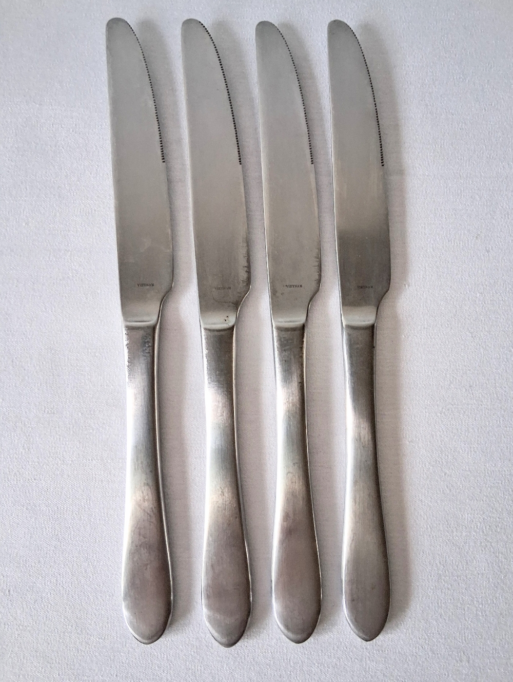 Group of 4 - Robert Welch "Meridian" Satin Dinner Knives 18/10